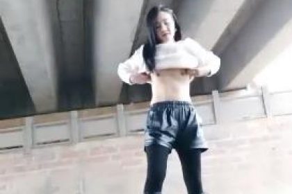 A naughty young woman masturbates outdoors under a bridge while driving, seducing a sanitation man to touch her ass, then gets back in the car and vibrates her pussy in the back seat.
