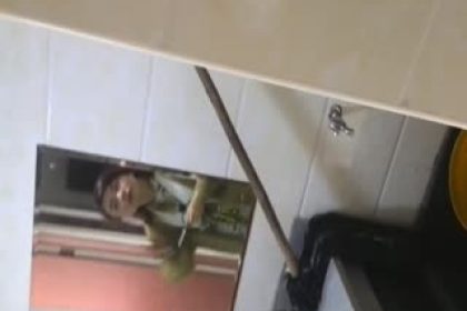 Domestic celebrity sneaked into the women’s restroom of a building and peeped at a girl wearing strappy sandals peeing