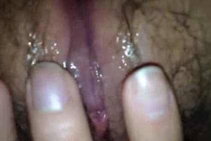 Masturbating the tender pussy.  .Water comes out when you touch it