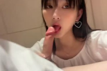 Big-eyed girl gives her boyfriend several blowjobs.